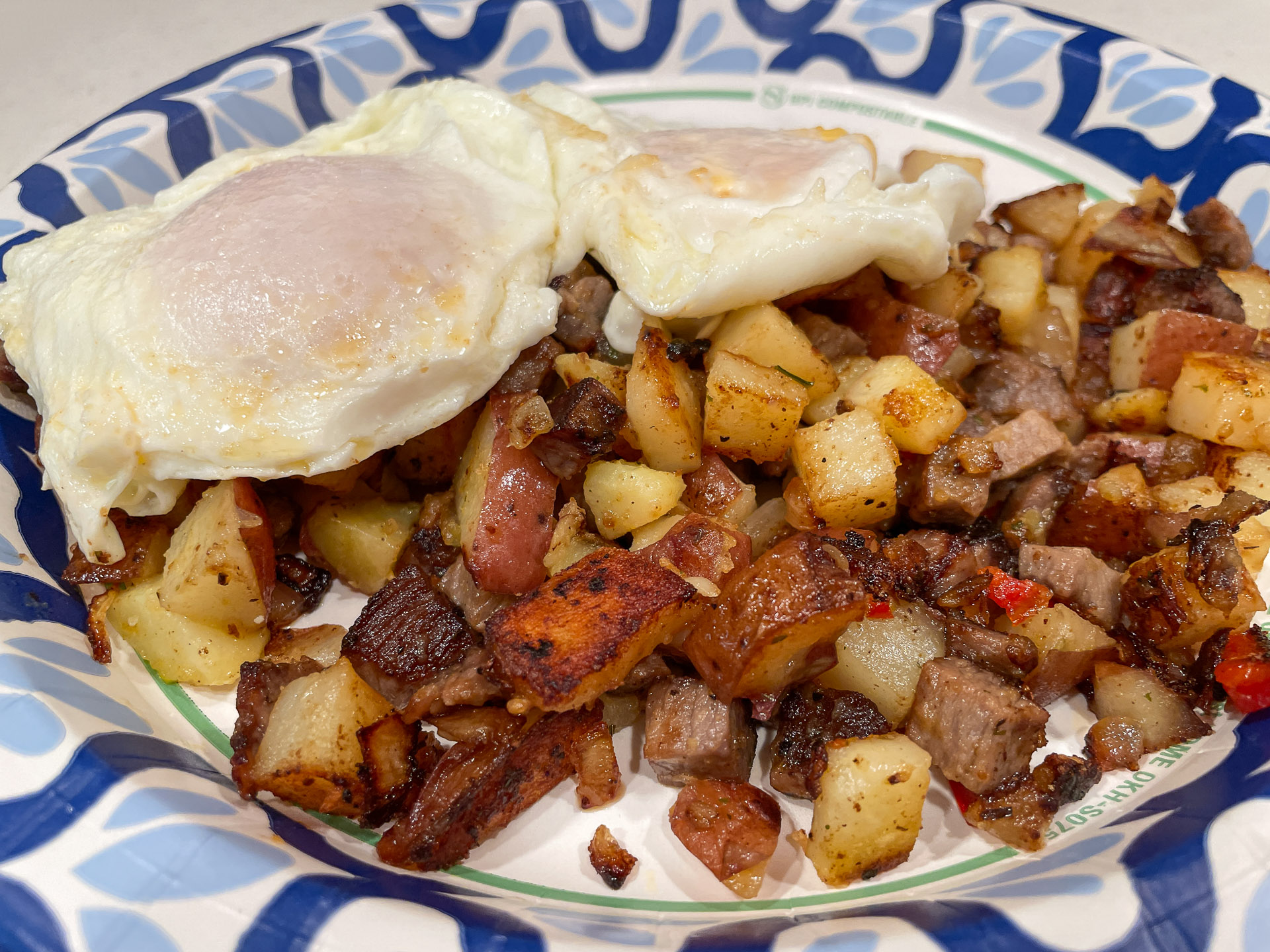 Fried Potatoes with Eggs on Top