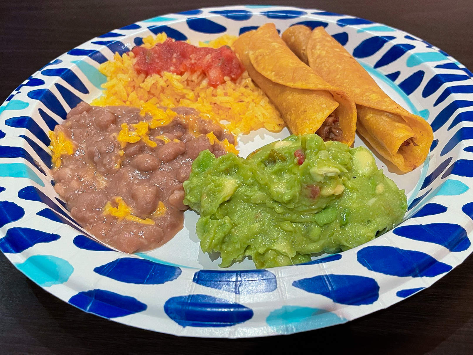 Taquitos, Beans, Rice, and Guacamole