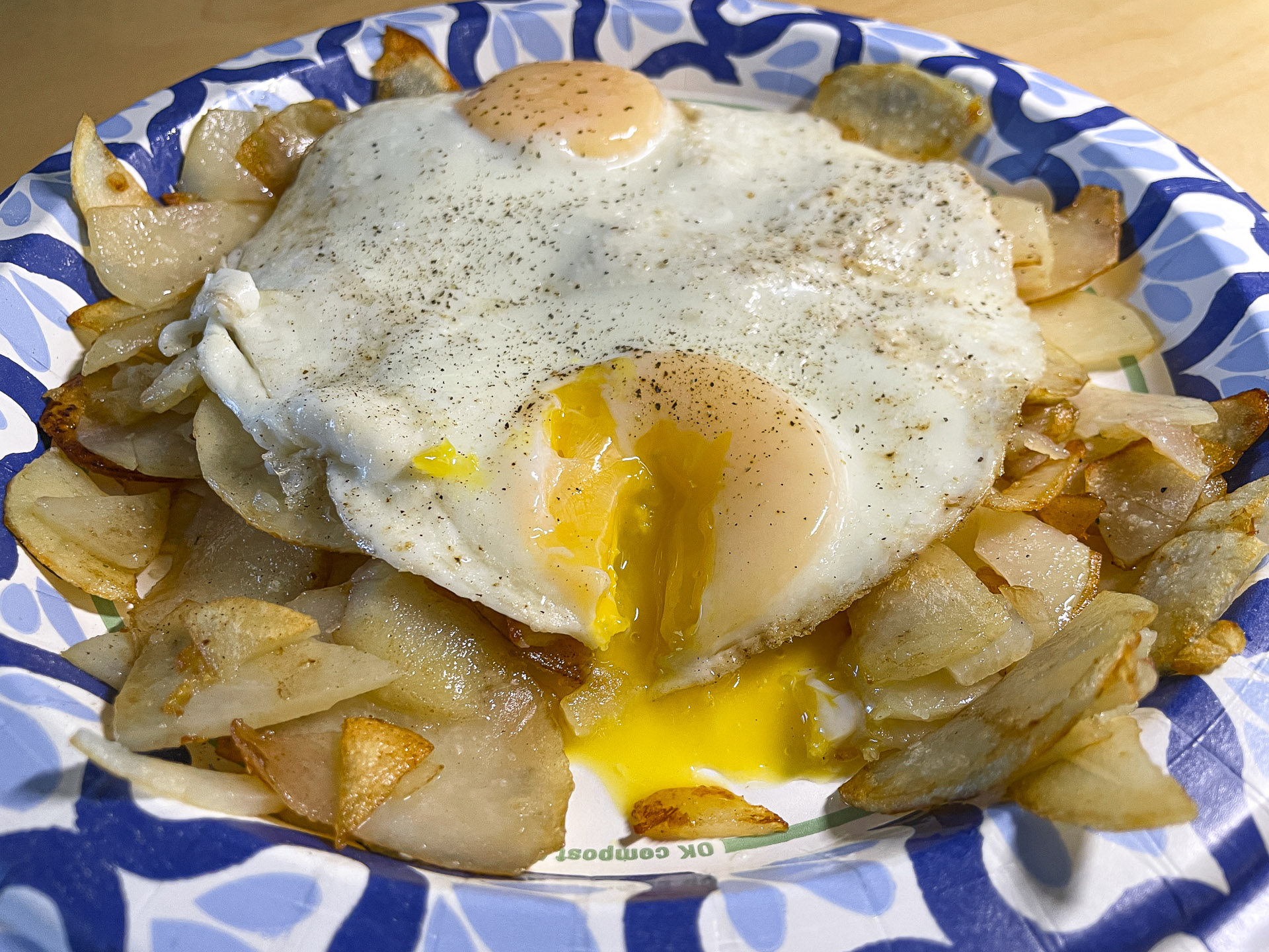 Fried Potatoes and Sunny Side Up Eggs